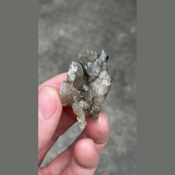 Small smoky grey quartz cluster from Inner Mongolia — alternate view
