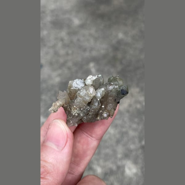 Small smoky grey quartz cluster from Inner Mongolia — alternate view