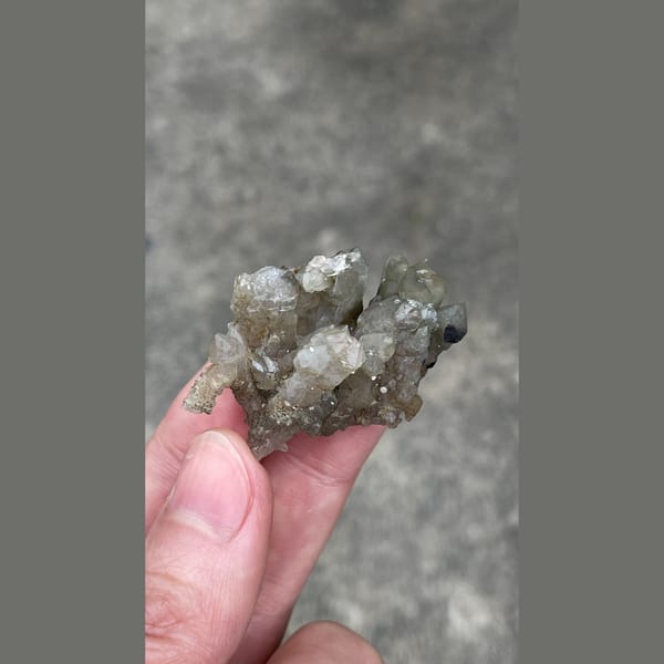Small smoky grey quartz cluster from Inner Mongolia — detail view