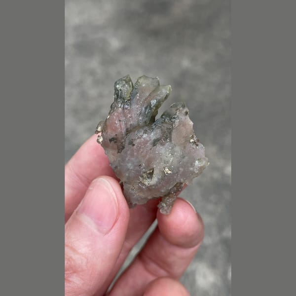 Small smoky grey quartz cluster from Inner Mongolia — detail view