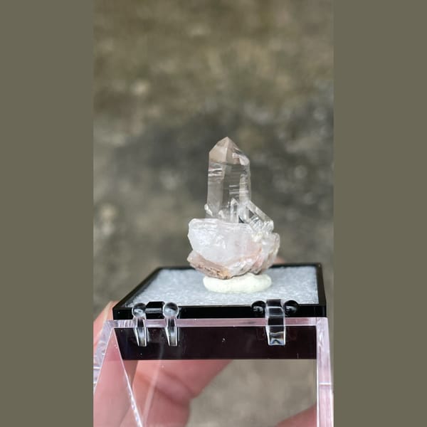 Small clear quartz point on matrix from Guangdong — detail view