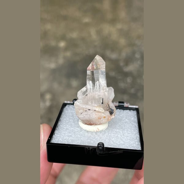 Small clear quartz point on matrix from Guangdong — detail view