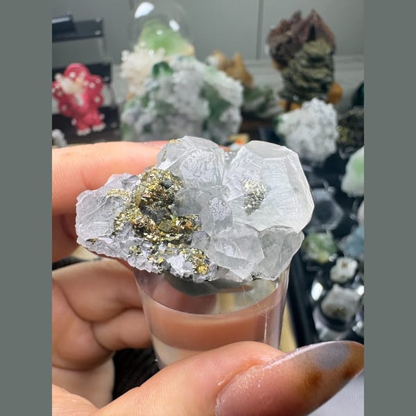 Translucent calcite crystals with brassy pyrite — alternate view