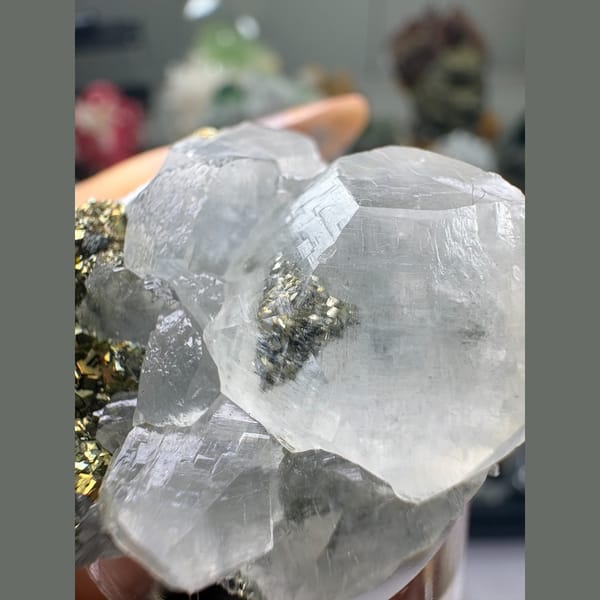 Translucent calcite crystals with brassy pyrite — alternate view