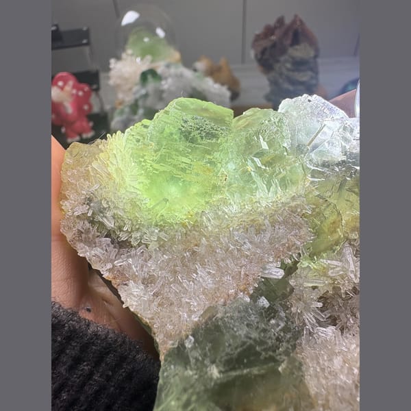Transparent stepped green fluorite with quartz from Fujian — complete view