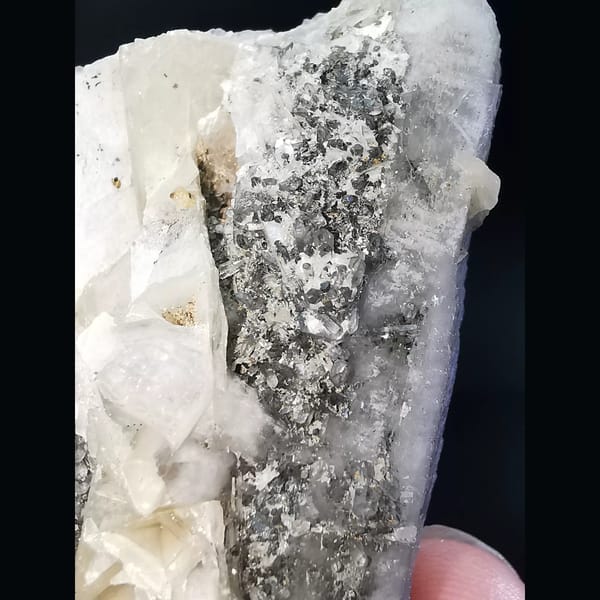 Quartz with calcite and small quartz crystals — detail view