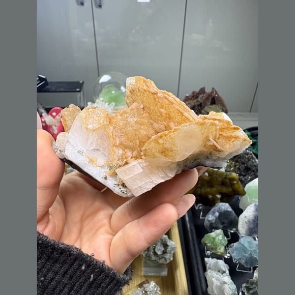 Orange-yellow biscuit calcite with pyrite from Fujian — alternate view