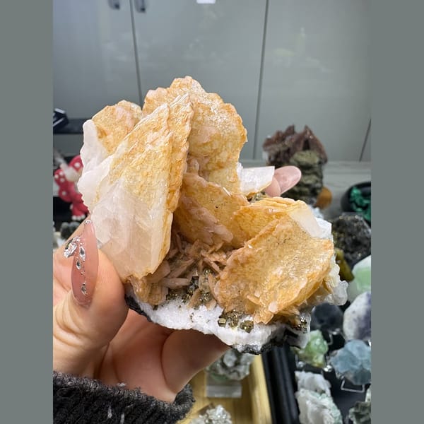 Orange-yellow biscuit calcite with pyrite from Fujian — alternate view