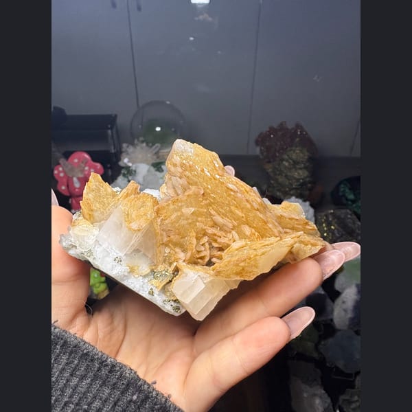 Orange-yellow biscuit calcite with pyrite from Fujian — detail view