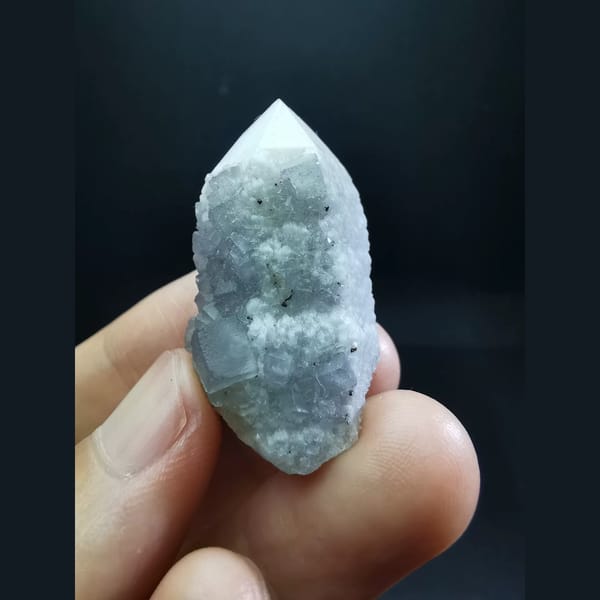 Pale blue-purple fluorite on white candle quartz — alternate view