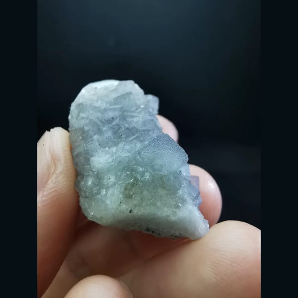 Pale blue-purple fluorite on white candle quartz — alternate view
