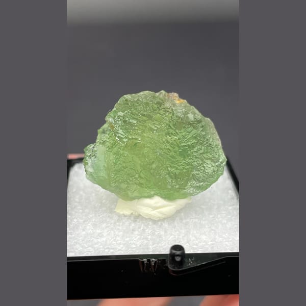 Glassy translucent green fluorite from Henan — complete view