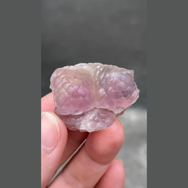 Pink purple sculpted fluorite from Zhejiang — complete view