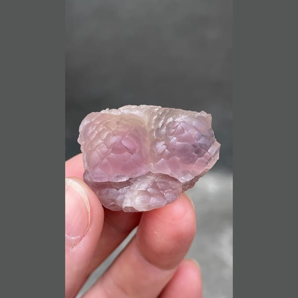 Pink purple sculpted fluorite from Zhejiang — alternate view