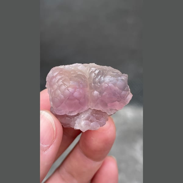 Pink purple sculpted fluorite from Zhejiang — alternate view