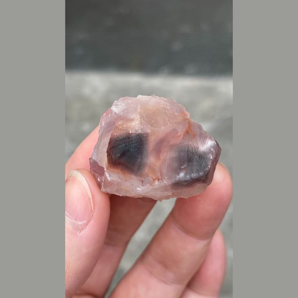 Pink purple sculpted fluorite from Zhejiang — detail view