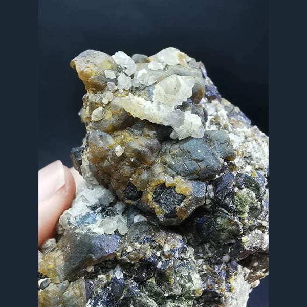 Garnet with quartz and specular hematite — complete view