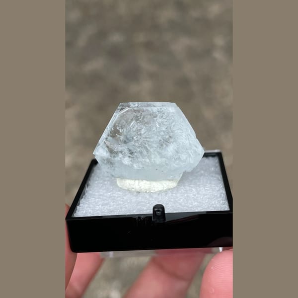 Pale blue tabular aquamarine crystal from Xuebaoding — complete view