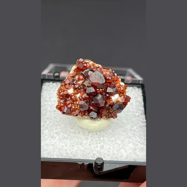 Sparkling red orange garnet cluster from Fujian — alternate view