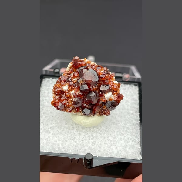 Sparkling red orange garnet cluster from Fujian — alternate view