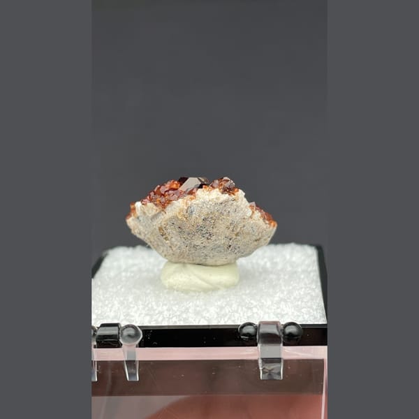 Sparkling red orange garnet cluster from Fujian — detail view