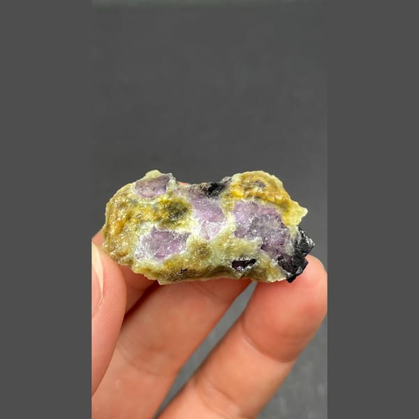 Dark fluorite cubes on pale mica from Inner Mongolia — detail view