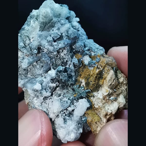 Golden helvine cluster with interference quartz — detail view