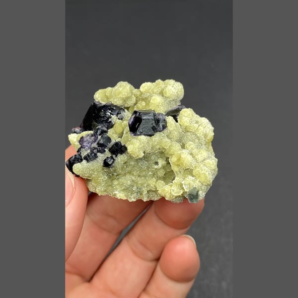 Dark fluorite cluster on mica from Inner Mongolia — alternate view