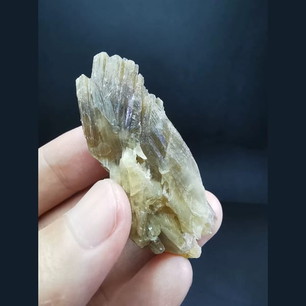 Acicular amber calcite cluster — detail view