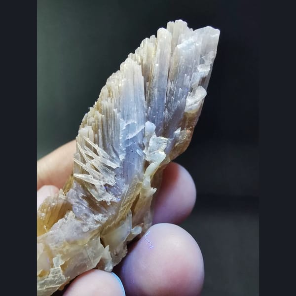 Acicular amber calcite cluster — detail view