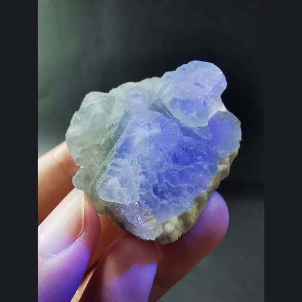 Green fluorite cluster on quartz matrix — alternate view