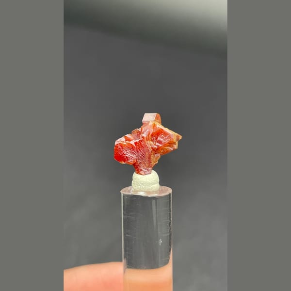Tiny stacked red vanadinite crystals from Morocco — complete view