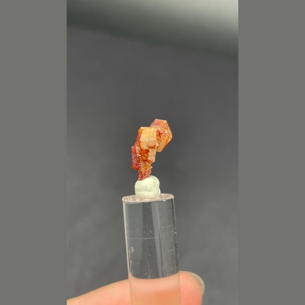 Tiny stacked red vanadinite crystals from Morocco — alternate view