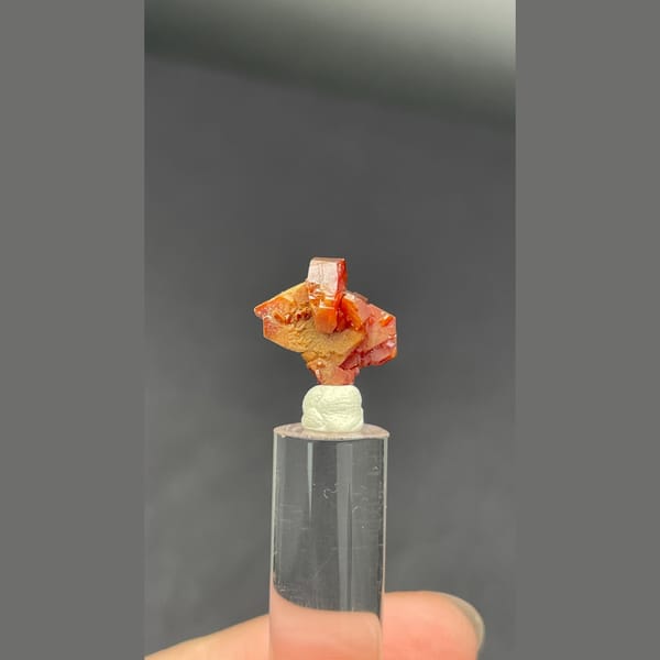 Tiny stacked red vanadinite crystals from Morocco — alternate view