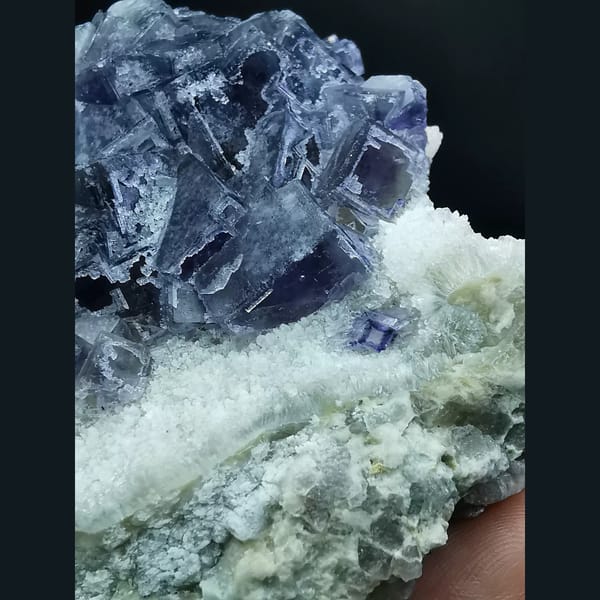 Etched purple fluorite cluster from Jinshan, Chifeng — alternate view