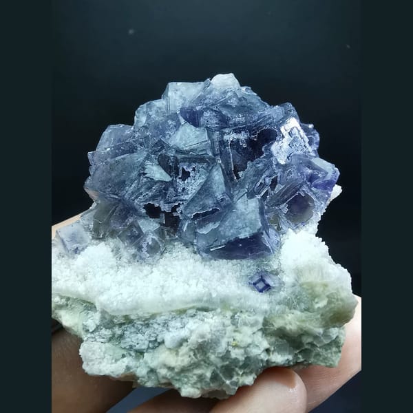 Etched purple fluorite cluster from Jinshan, Chifeng — detail view