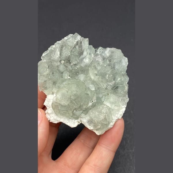 Pale green fluorite on white quartz from Guangdong — complete view