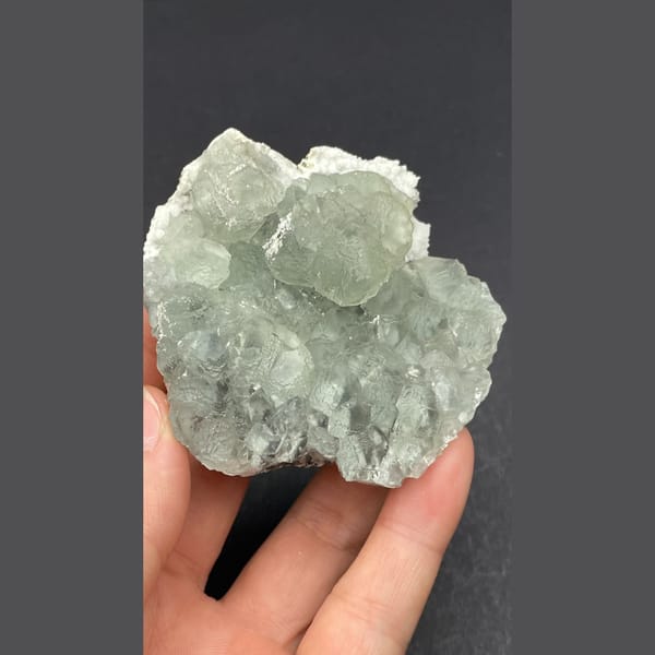 Pale green fluorite on white quartz from Guangdong — alternate view