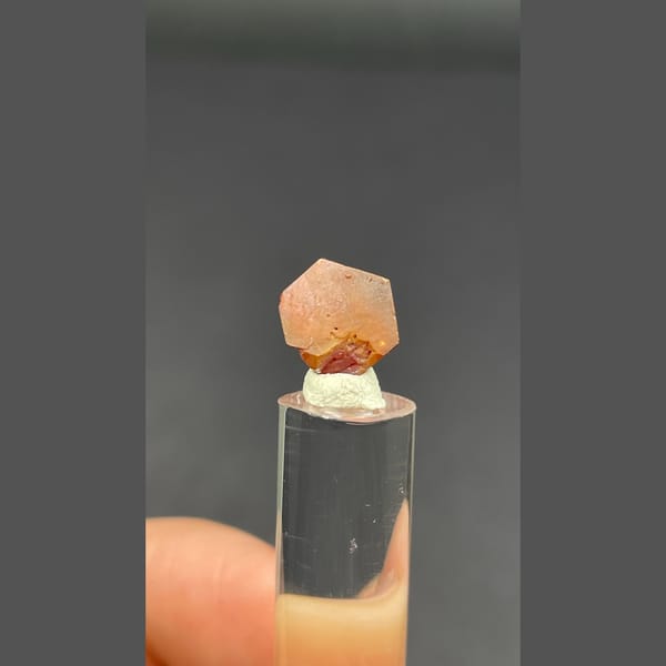 Single flat red vanadinite crystal from Morocco — complete view