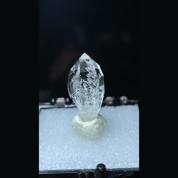 Clear quartz point with inclusion from Pakistan — complete view