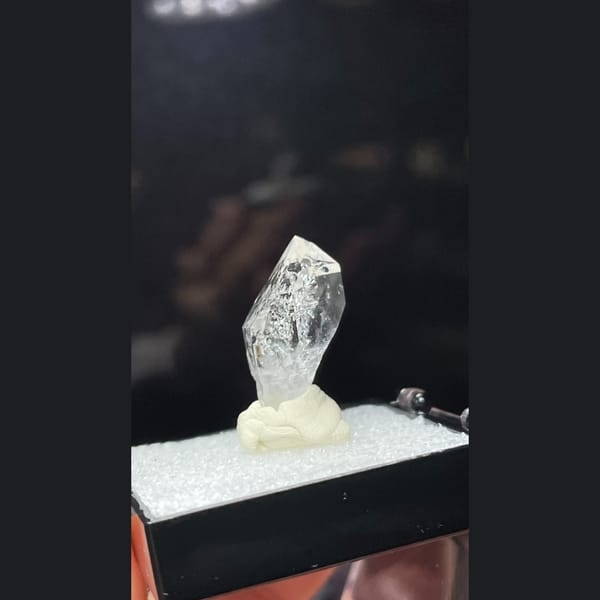 Clear quartz point with inclusion from Pakistan — alternate view