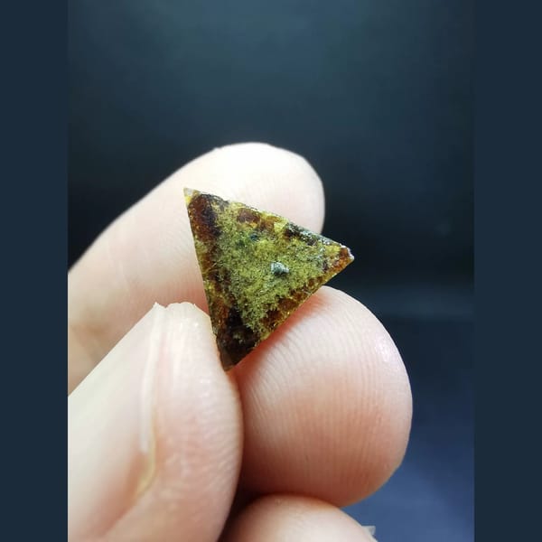 Gem-quality floater helvine crystal with sugary quartz — complete view