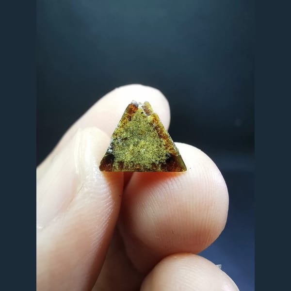 Gem-quality floater helvine crystal with sugary quartz — alternate view