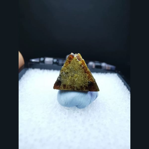Gem-quality floater helvine crystal with sugary quartz — detail view