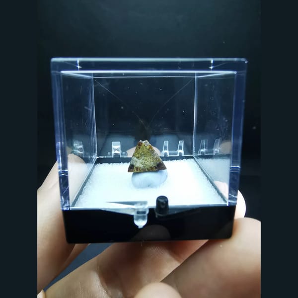 Gem-quality floater helvine crystal with sugary quartz — detail view