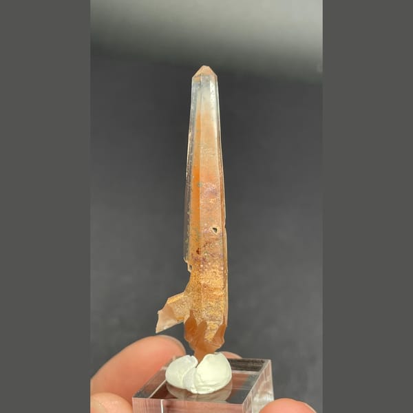 Slender quartz with red rutile needles from Madagascar — complete view
