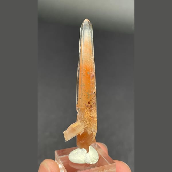 Slender quartz with red rutile needles from Madagascar — alternate view