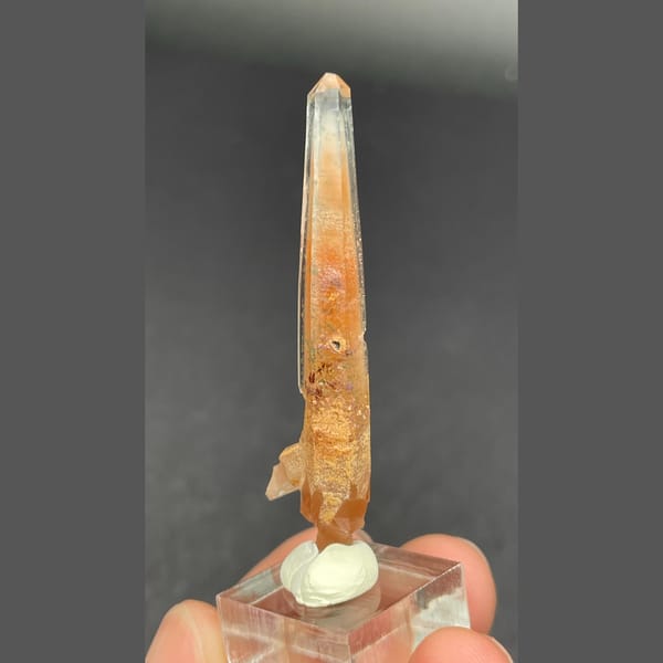 Slender quartz with red rutile needles from Madagascar — detail view