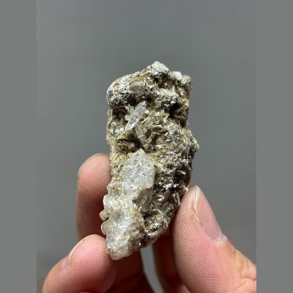 Quartz crusted with silvery mica from Xuebaoding, Sichuan — complete view