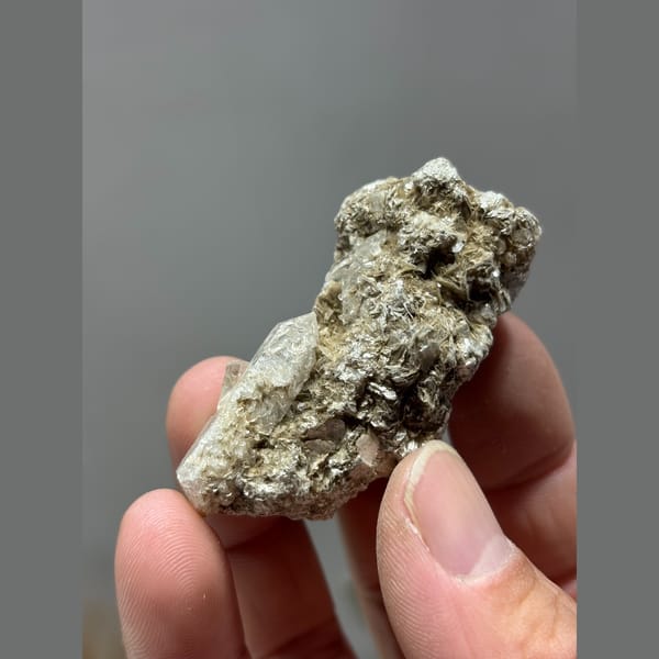 Quartz crusted with silvery mica from Xuebaoding, Sichuan — alternate view